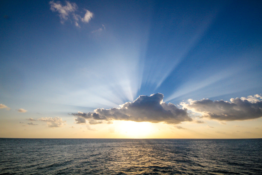 sun-setting-over-ocean